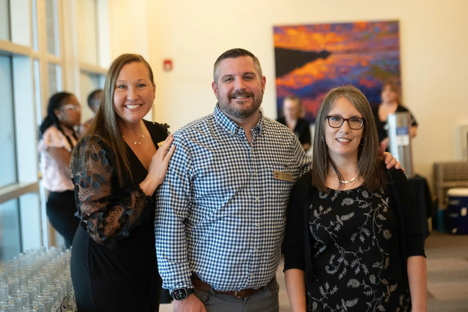 Ryan Tiffin with colleagues at an Arkansas tourism event