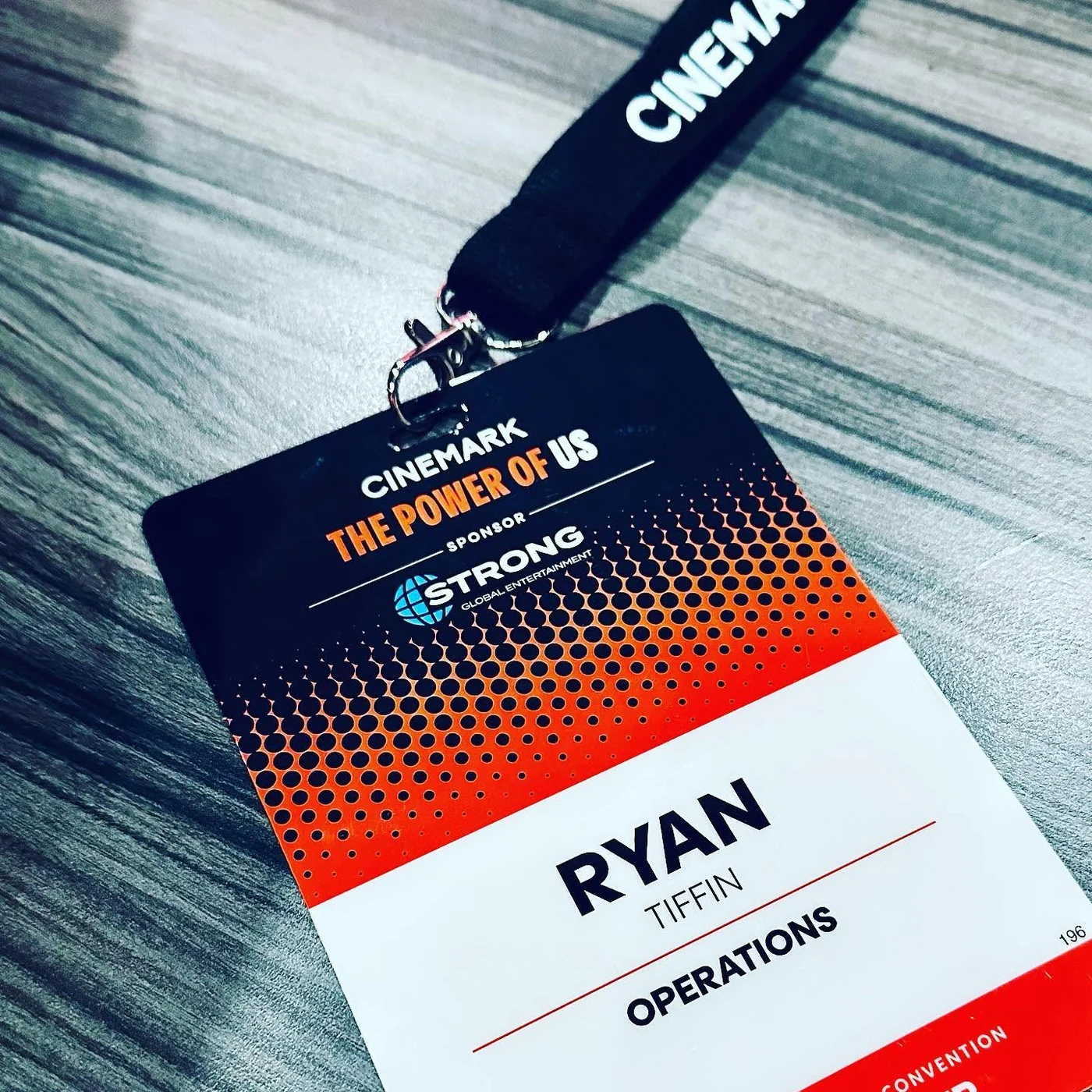 Ryan Tiffin's Cinemark operations convention credential featuring The Power of Us