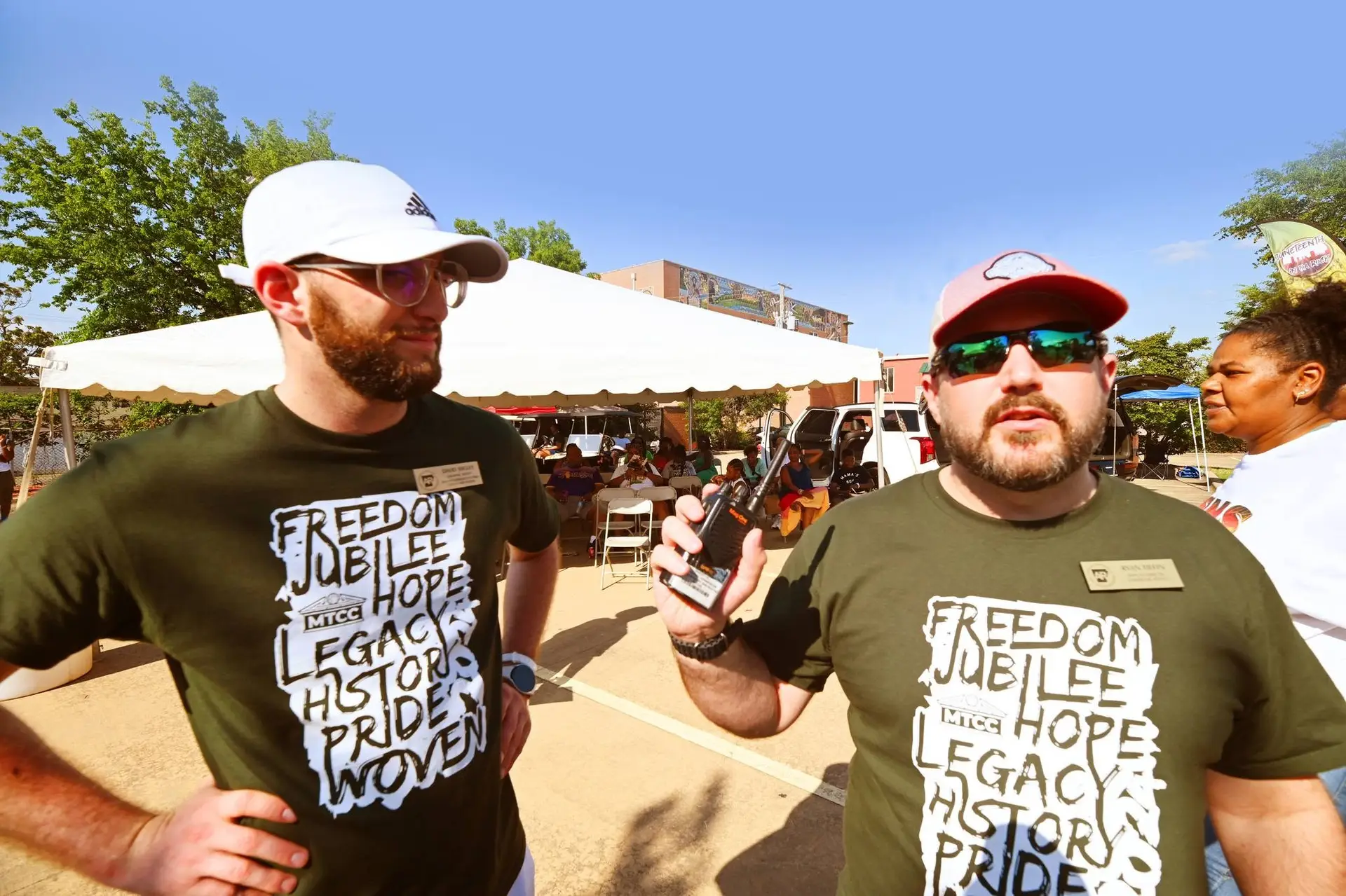 Ryan coordinating a festival operation outdoors, showing the backstage preparation behind a guest experience.