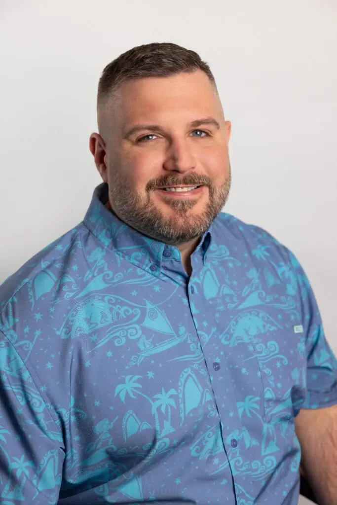 Ryan Tiffin working in a creative professional setting, representing transferable experience, career growth, and the recurring problems leaders learn to solve.